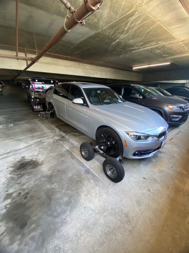 A parking garage with so many parked cars